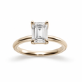 Emerald cut diamond engagement ring in a high profile tulip setting