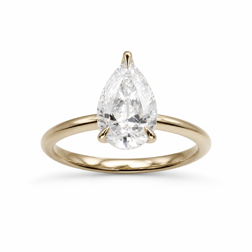 Pear diamond engagement ring in a high profile tulip setting