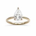 Pear diamond engagement ring in a high profile tulip setting